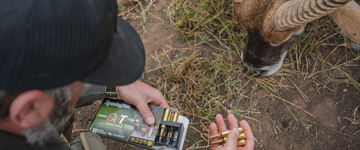 hunter holding Premier CuT in their hand with a bead waterbuck